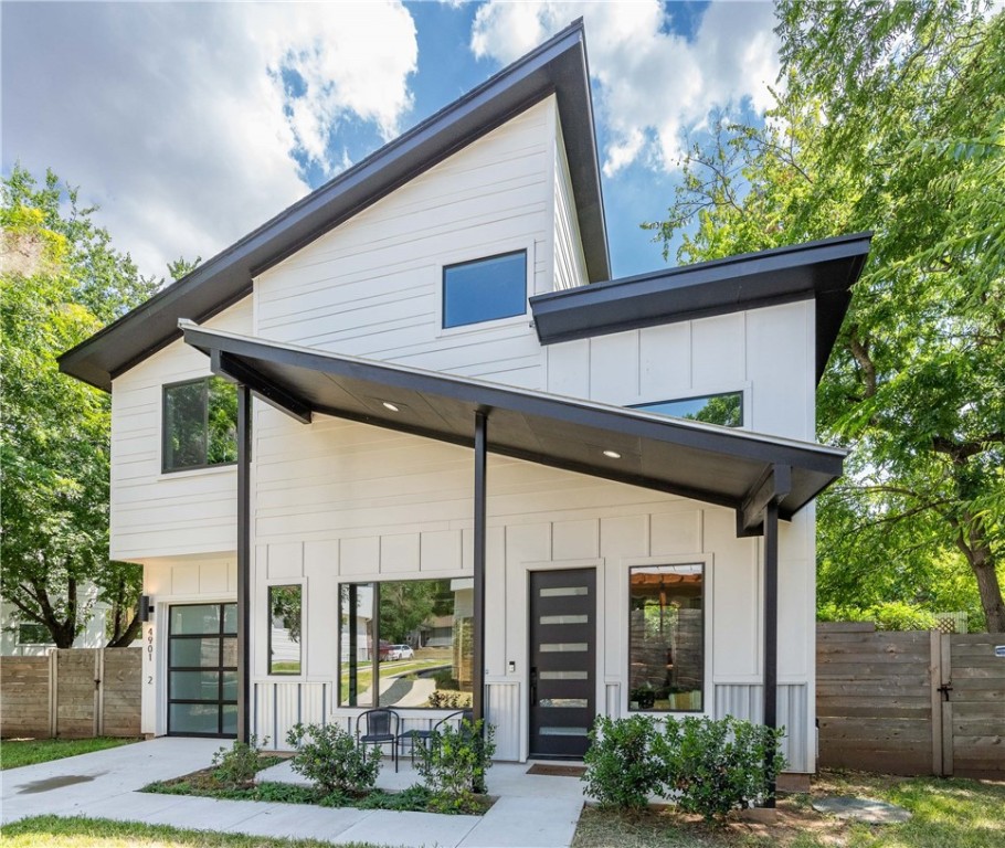 4901 Lyons Road, Unit 2 Austin, TX 78702 - Photo 1 of 1 a front view of a house with garden