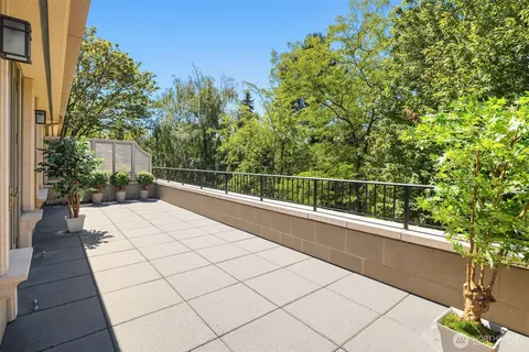 a view of balcony with furniture