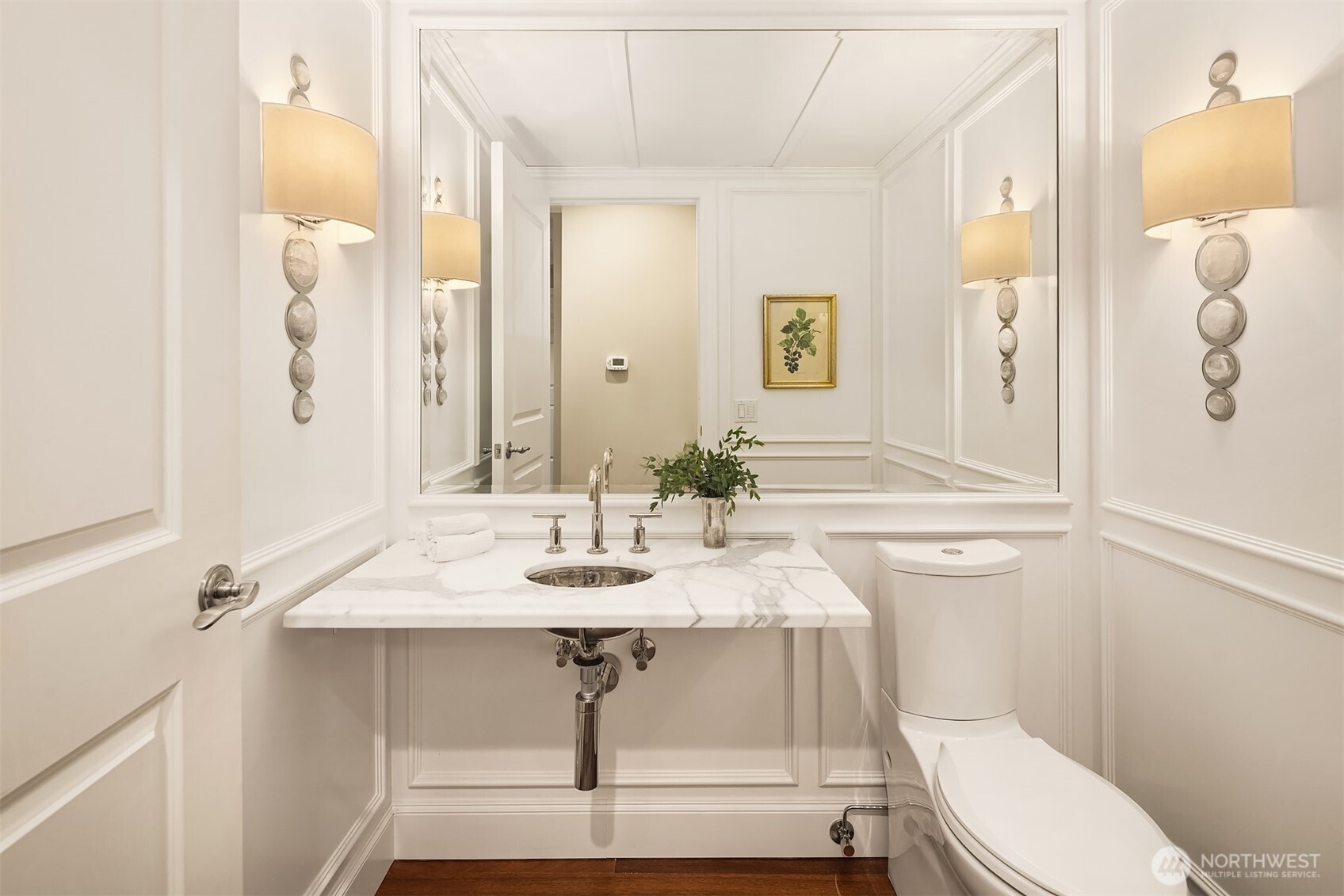 1168 Harvard Avenue East, Unit P7 Seattle, WA 98102 - Photo 20 of 24 a bathroom with a sink a toilet and shower curtain
