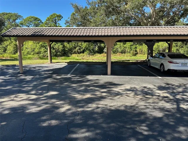 a view of swimming pool with a patio