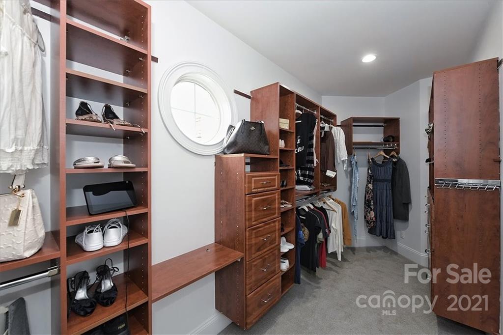 3425 Millstone Creek Road Lancaster, SC 29720 - Photo 28 of 48 a view of walk in closet with clothes and shoes
