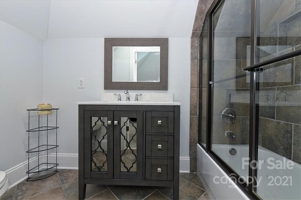 3425 Millstone Creek Road Lancaster, SC 29720 - Photo 35 of 48 a bathroom with a bathtub and a shower