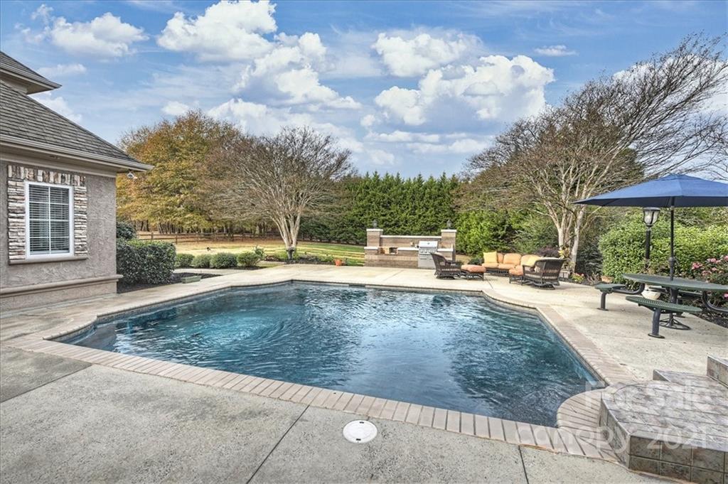 3425 Millstone Creek Road Lancaster, SC 29720 - Photo 40 of 48 a view of a swimming pool with a patio