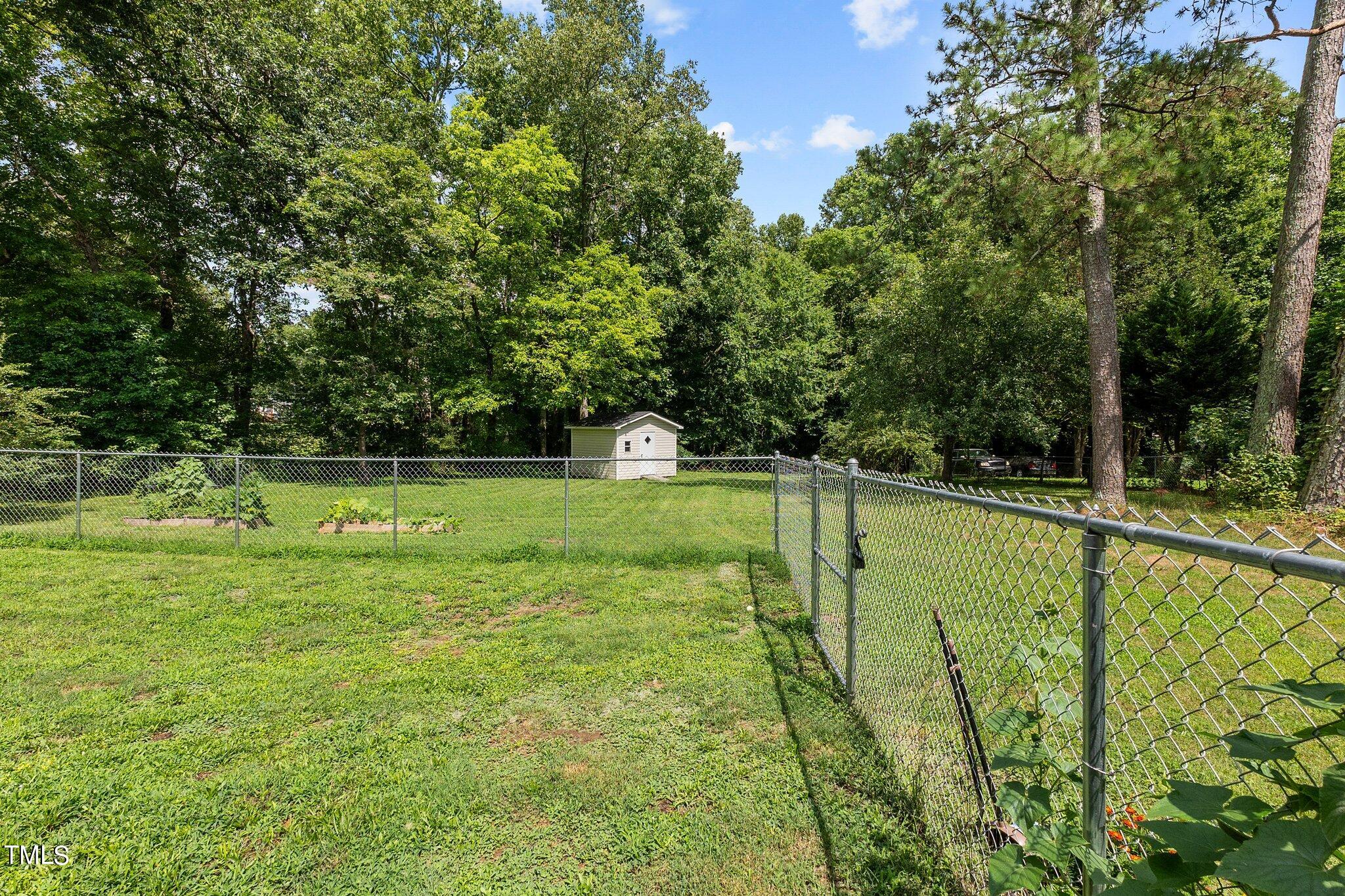 4317 Hicks Road Garner, NC 27529 - Photo 29 of 45 Side Yard-Shed View