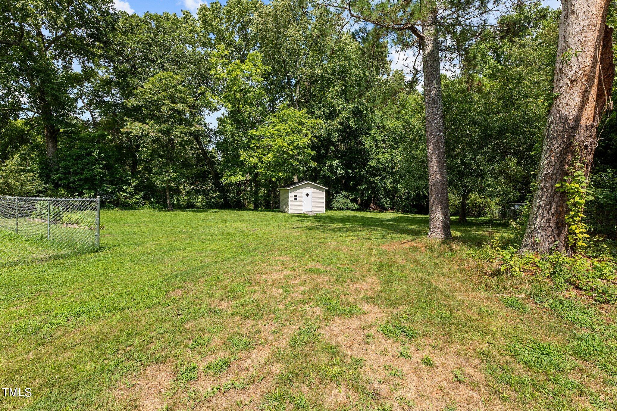 4317 Hicks Road Garner, NC 27529 - Photo 30 of 45 Back Yard-Shed View