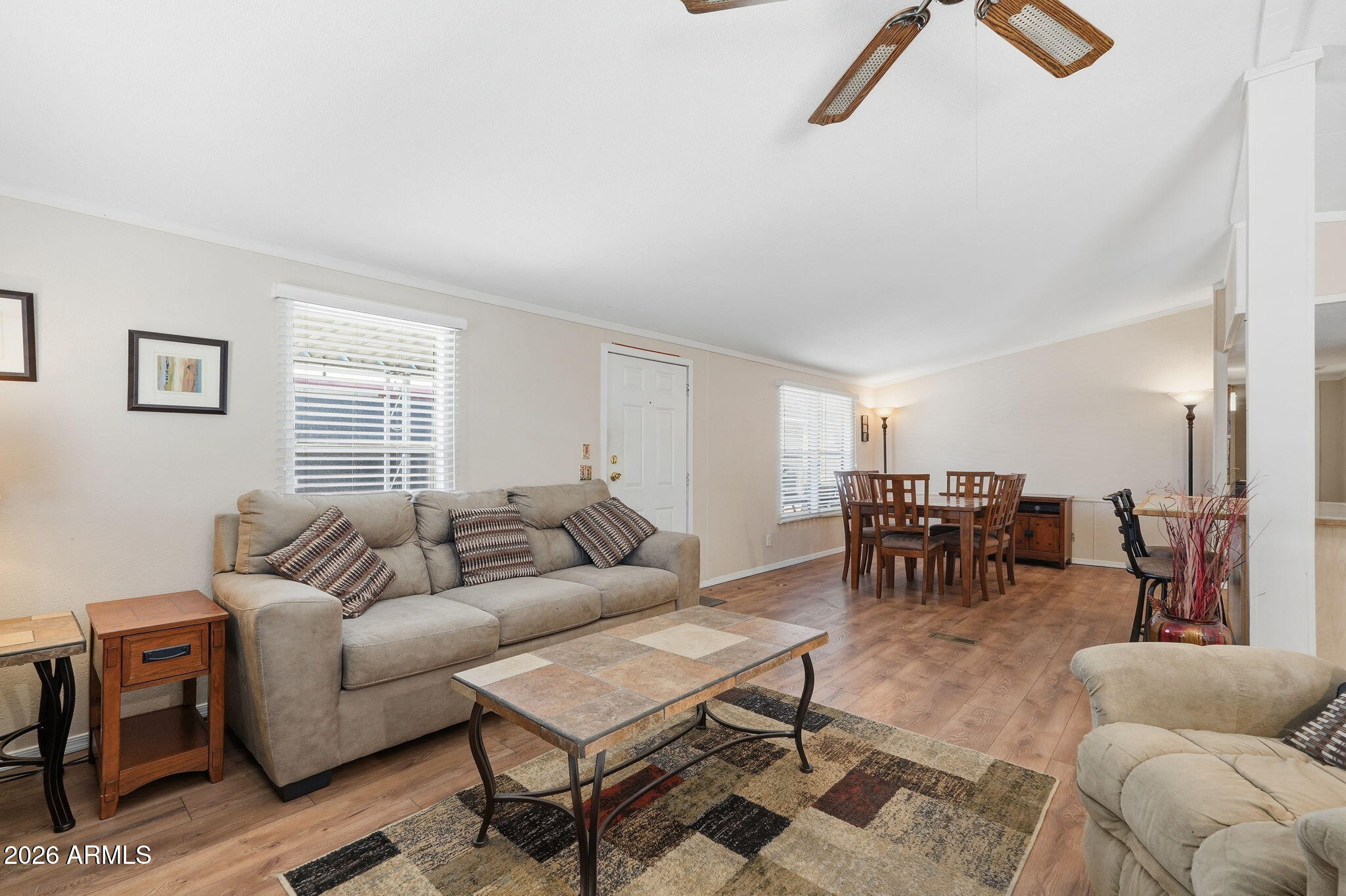 53 North Mountain Road, Unit 38 Apache Junction, AZ 85120 - Photo 7 of 35 a living room with furniture and a large window