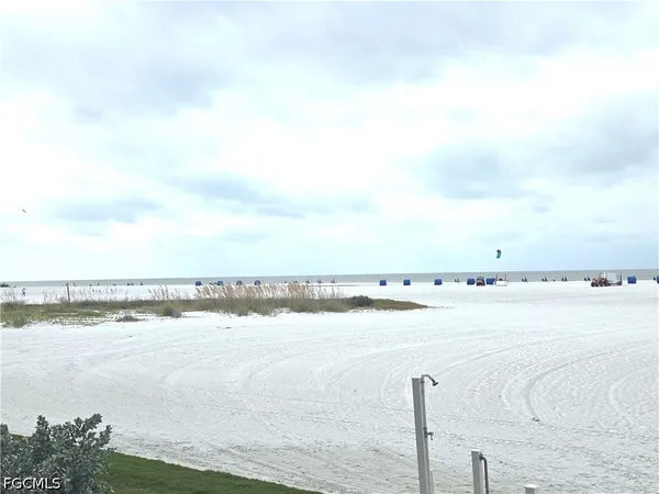 a view of an ocean and city