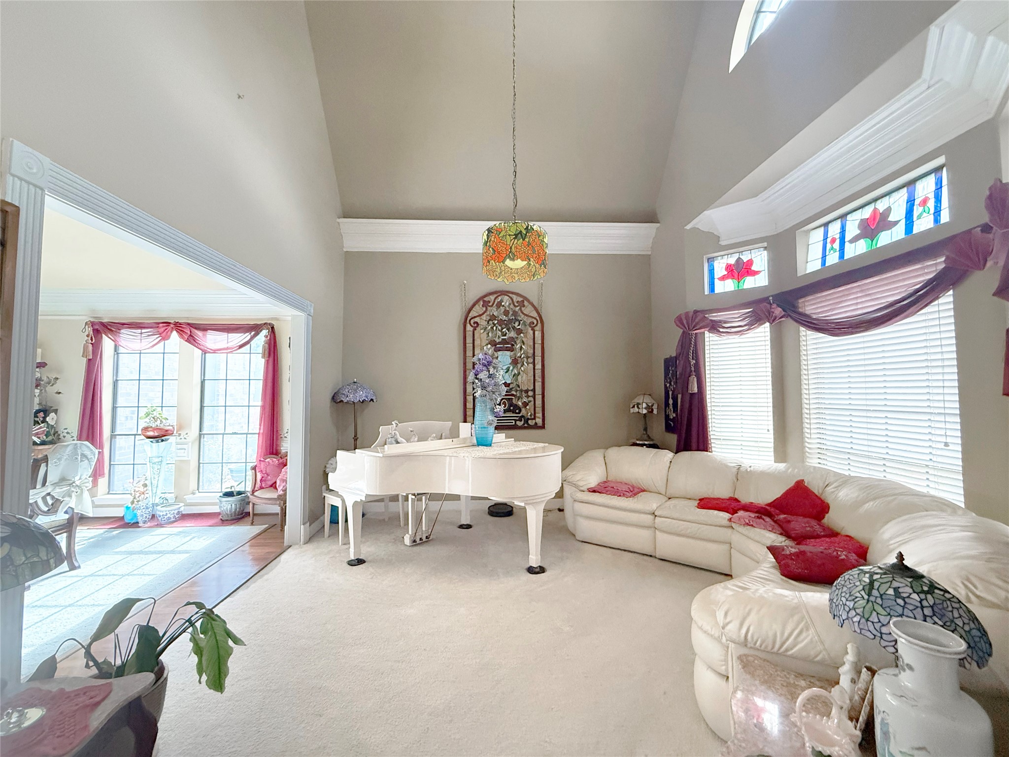 17310 Wyeth Circle Spring, TX 77379 - Photo 7 of 50 Formal living faces the front yard and is open to formal dining. Light & bright with floor to ceiling windows, soaring ceilings and massive millwork create a calm soothing space