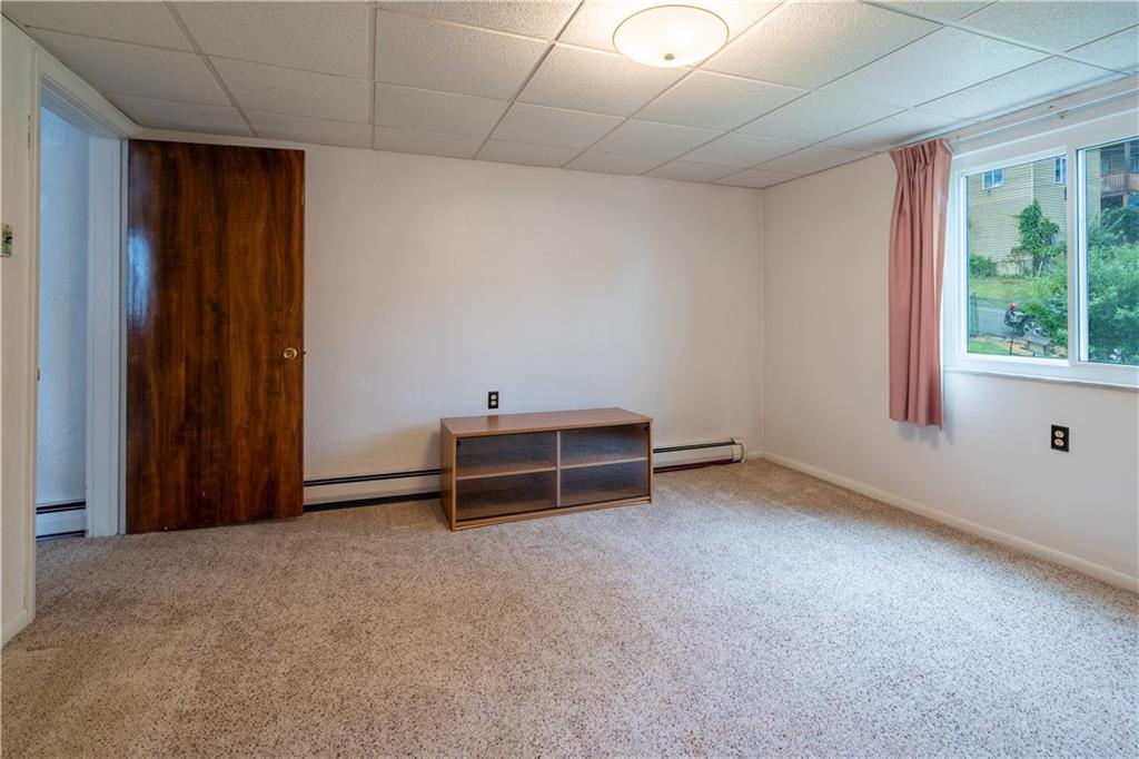 2509 Spring Street Pittsburgh, PA 15210 - Photo 23 of 31 an empty room with windows