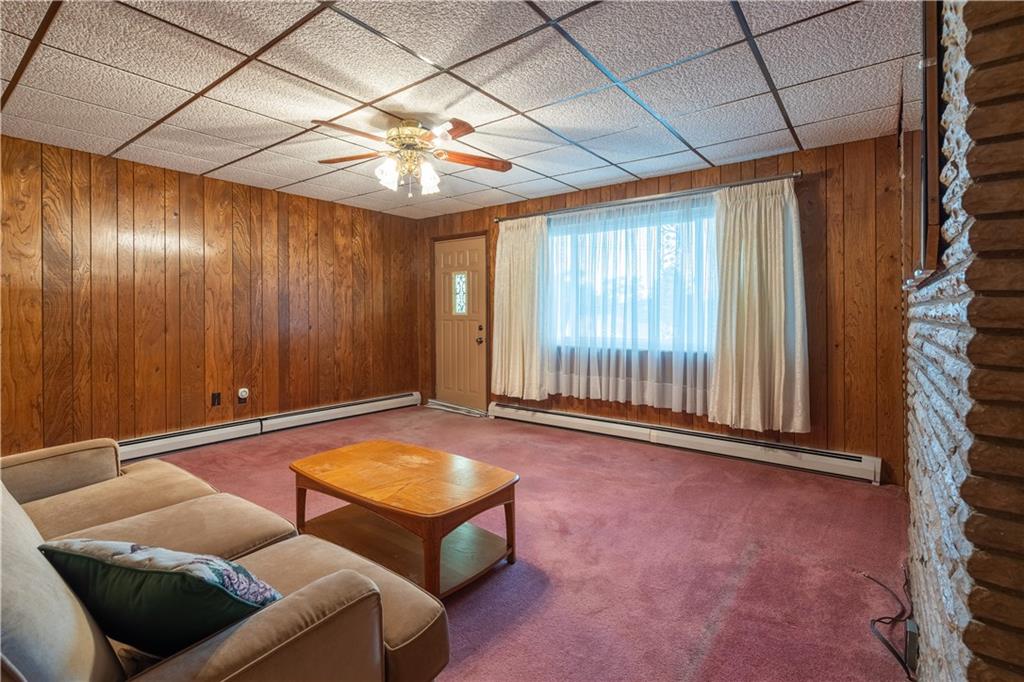 2509 Spring Street Pittsburgh, PA 15210 - Photo 10 of 31 a living room with furniture and a window