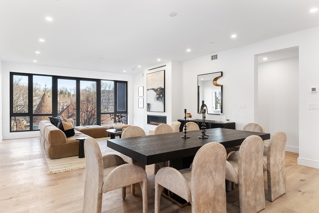 41 University Road, Unit 3 Brookline, MA 02445 - Photo 8 of 21 a view of a dining room with furniture