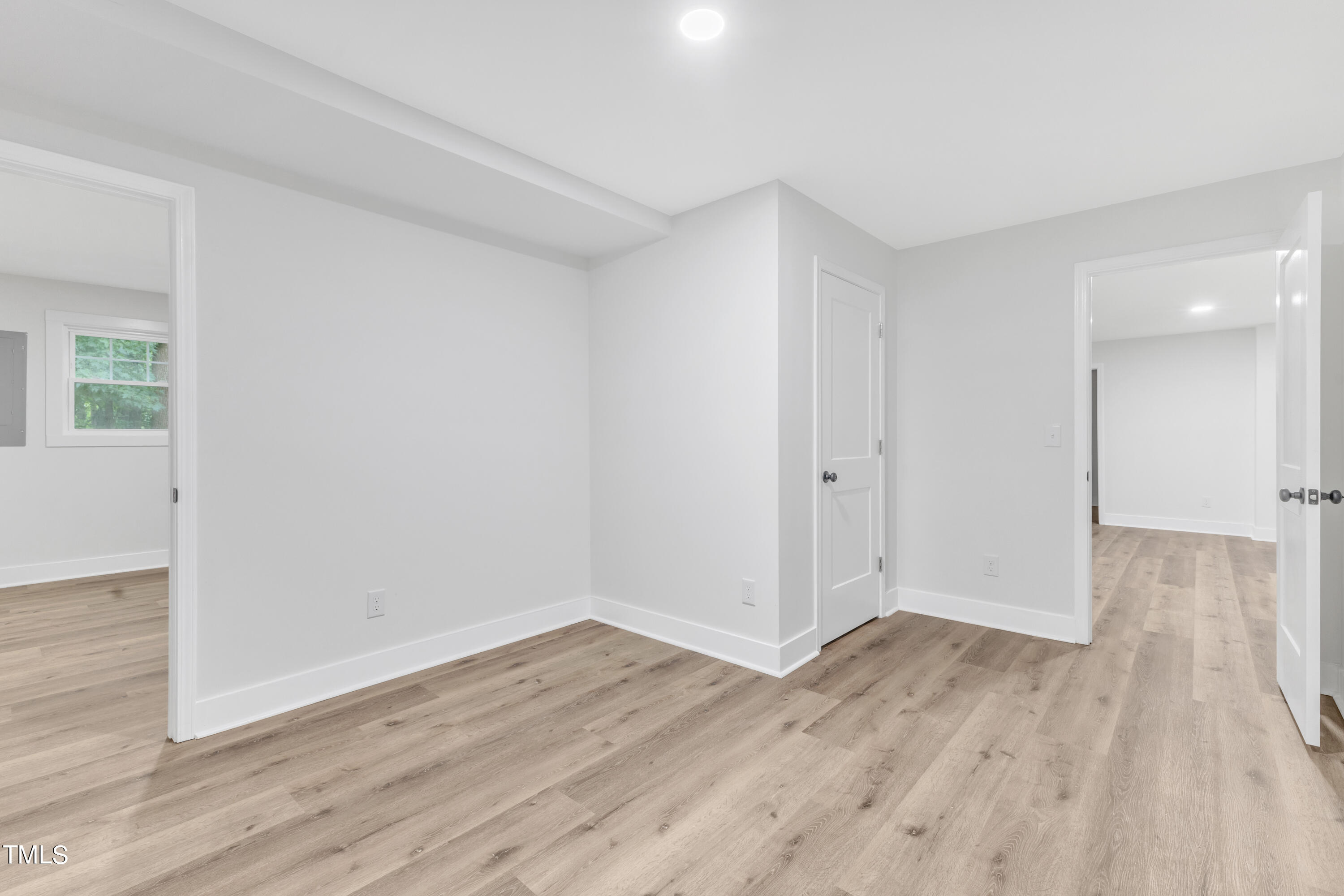Undisclosed Address Raleigh, NC 27615 - Photo 23 of 26 a view of a room with wooden floor