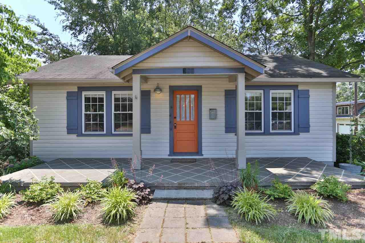 300 East Whitaker Mill Road Raleigh, NC 27608 - Photo 1 of 25 a front view of a house with a yard