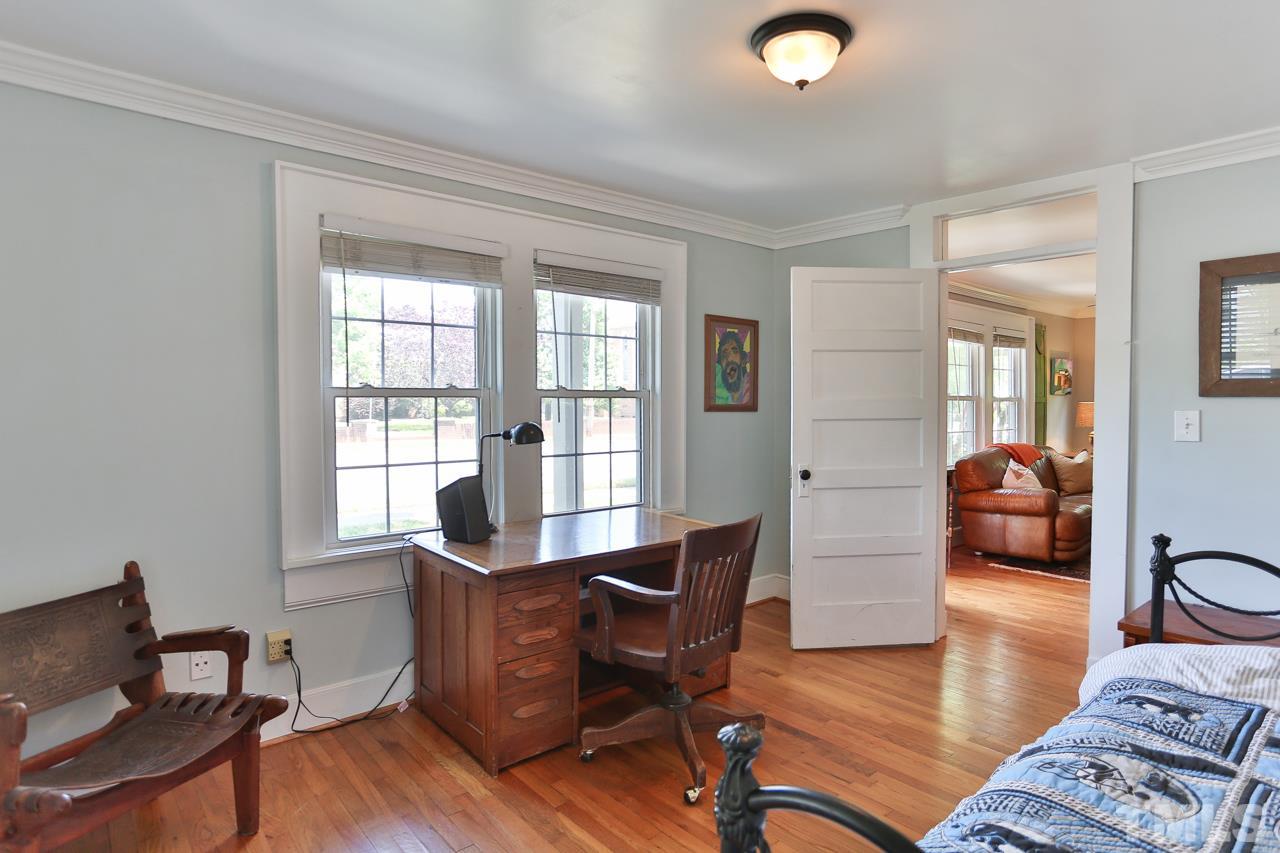 300 East Whitaker Mill Road Raleigh, NC 27608 - Photo 17 of 25 a living room with furniture and a window