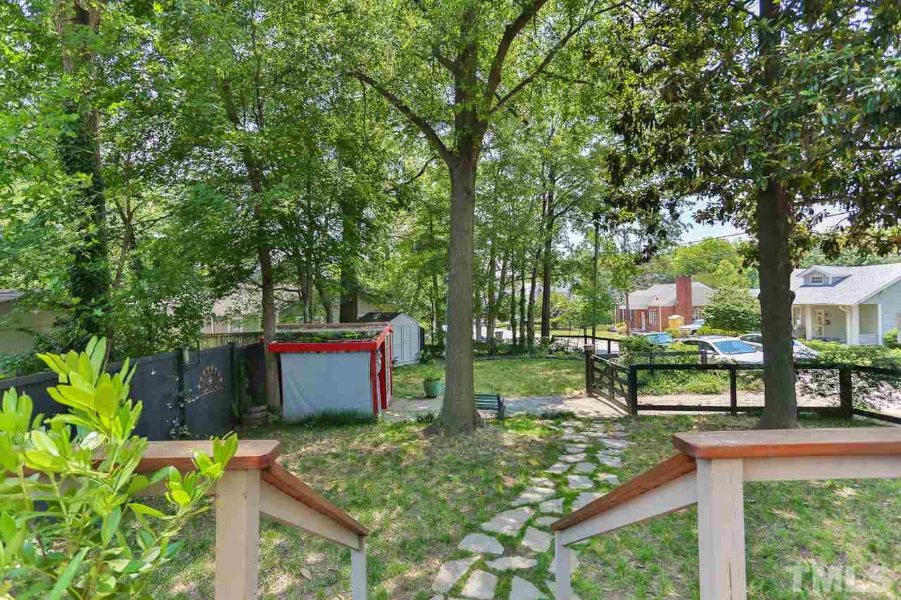 300 East Whitaker Mill Road Raleigh, NC 27608 - Photo 20 of 25 a garden view with a seating space