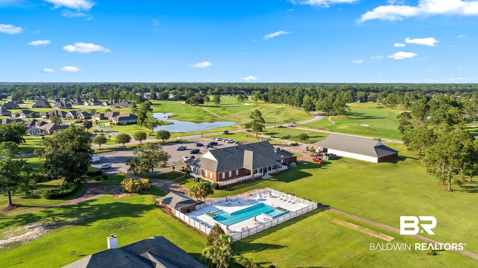 23357 Carnoustie Drive Foley, AL 36535 - Photo 91 of 99 Aerial view of residential area with a large body of water and a golf club