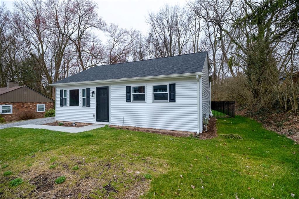 110 Neville Road Beaver, PA 15009 - Photo 2 of 22 a view of a house with a yard and large tree