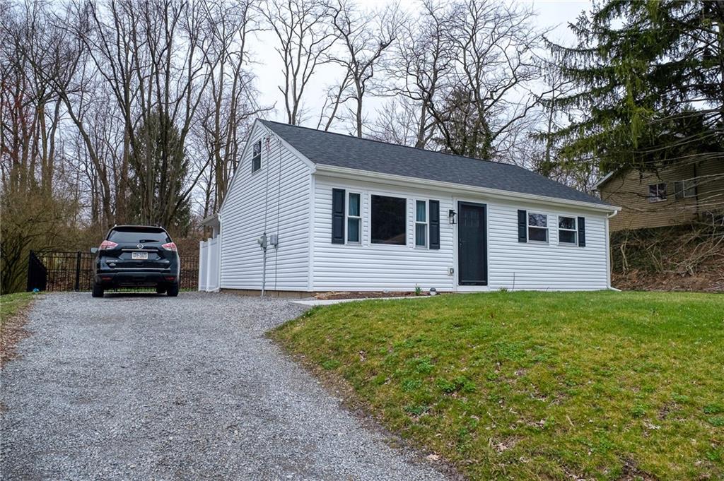 110 Neville Road Beaver, PA 15009 - Photo 3 of 22 a view of a house with a backyard