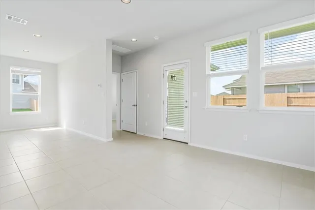 an empty room with windows