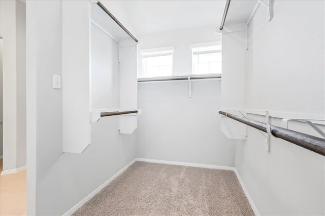 a view of a room with racks on the wall