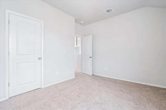 an empty room with an entryway