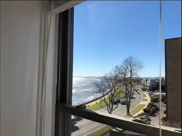 a bedroom with a bed and furniture