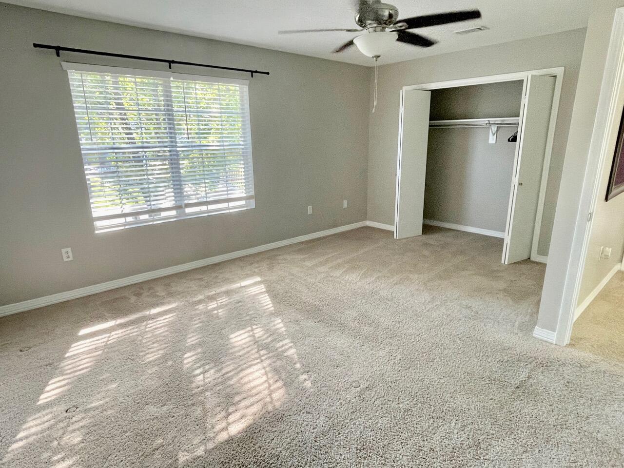115 Palmetto Drive Crestview, FL 32539 - Photo 15 of 27 a view of an empty room with a window