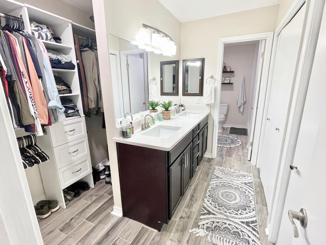 115 Palmetto Drive Crestview, FL 32539 - Photo 21 of 27 a kitchen with stainless steel appliances granite countertop a sink and a refrigerator