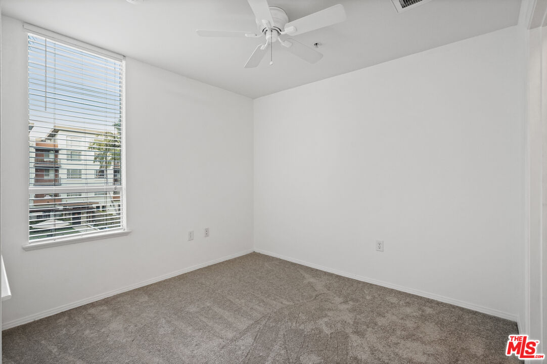100 South Alameda Street, Unit 346 Los Angeles, CA 90012 - Photo 11 of 24 an empty room with a window