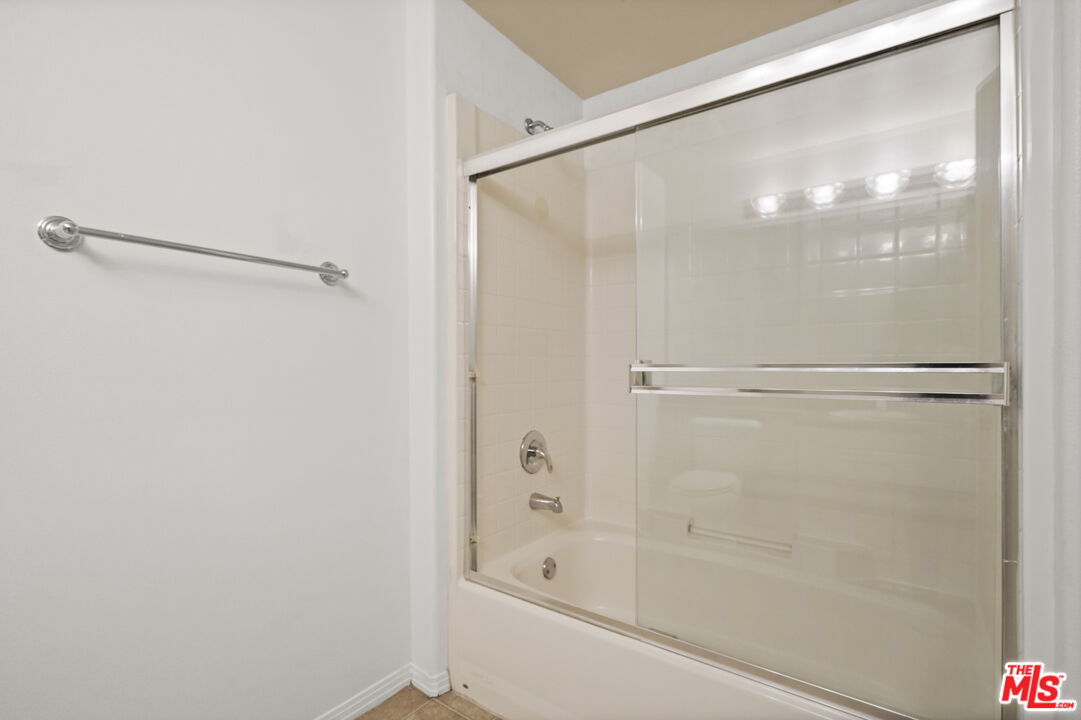 100 South Alameda Street, Unit 346 Los Angeles, CA 90012 - Photo 13 of 24 a bathroom with a bathtub and a shower