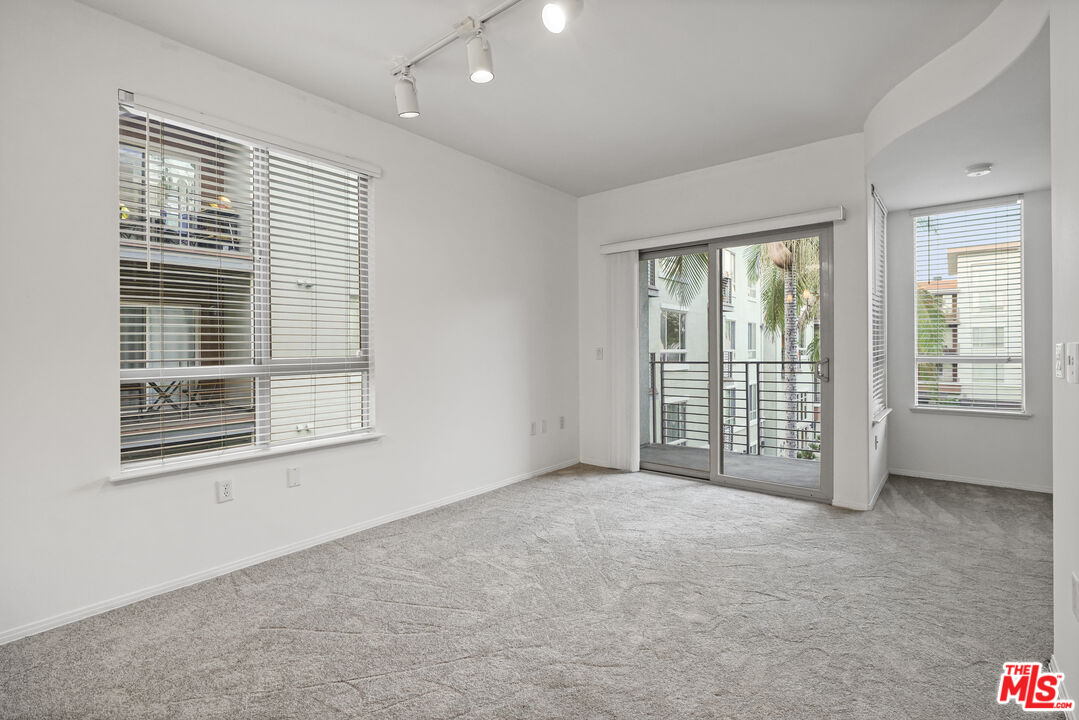 100 South Alameda Street, Unit 346 Los Angeles, CA 90012 - Photo 2 of 24 a view of an empty room with a window