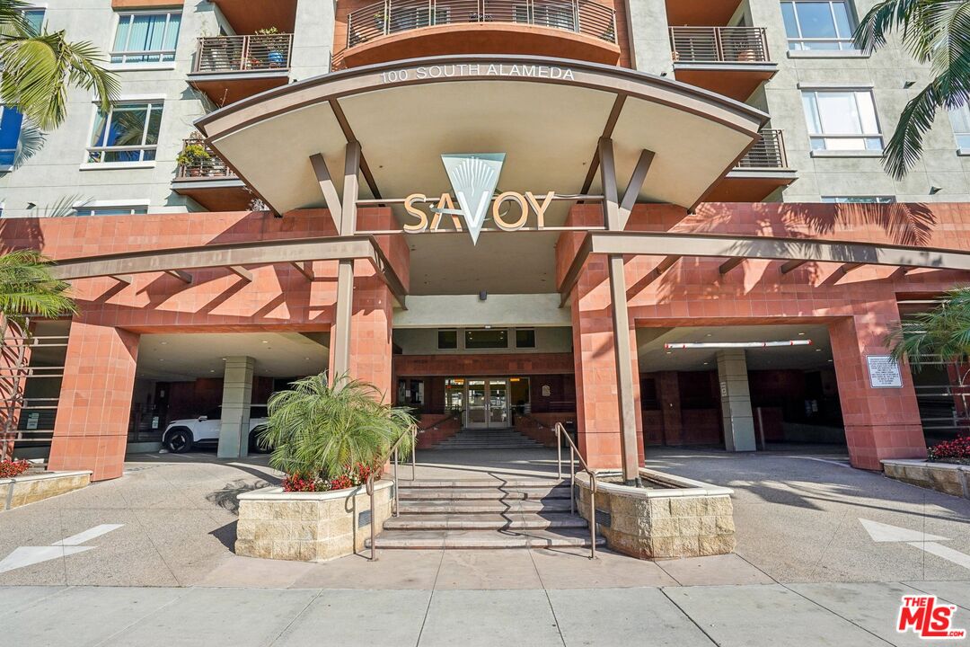 100 South Alameda Street, Unit 346 Los Angeles, CA 90012 - Photo 24 of 24 a view of a building with a door and windows