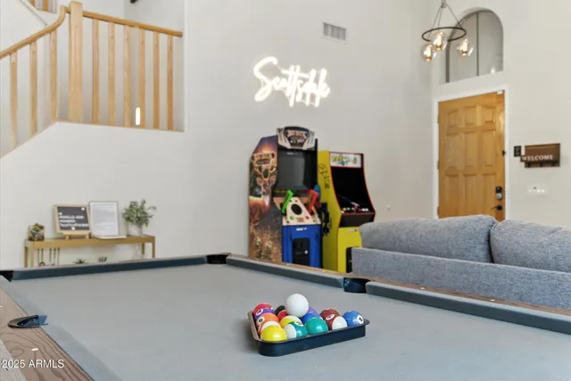 a living room with furniture and a couch