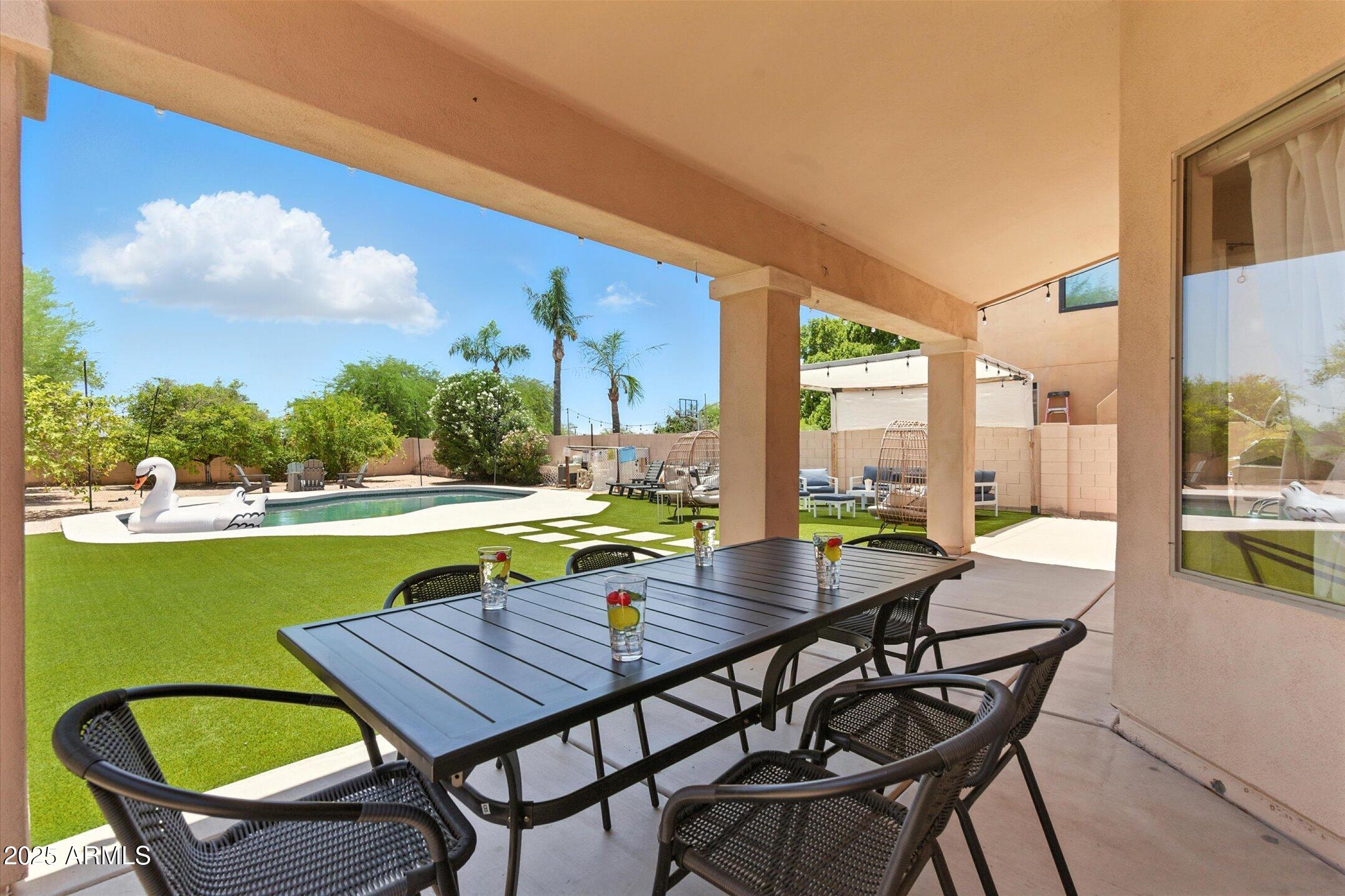 8083 East Michelle Drive Scottsdale, AZ 85255 - Photo 31 of 40 a view of an chairs and table in the balcony