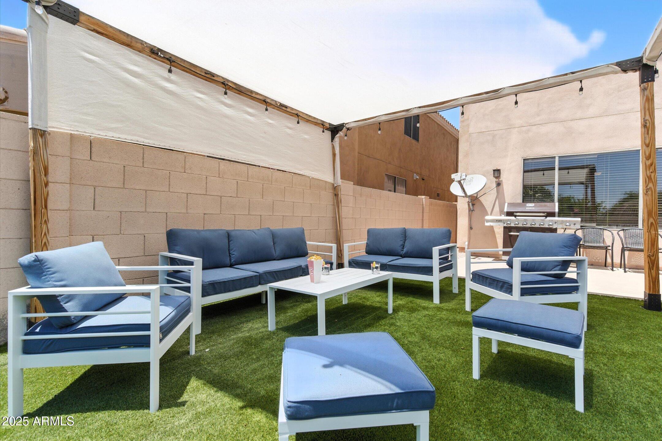 8083 East Michelle Drive Scottsdale, AZ 85255 - Photo 35 of 40 a couple of chairs sitting in the yard