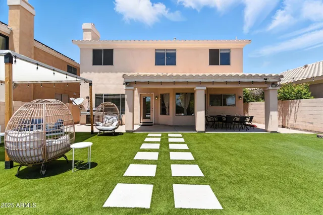 a view of a swimming pool with a patio