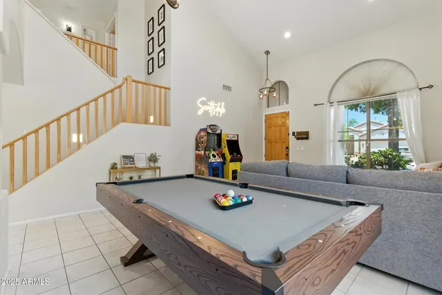 a living room with furniture and window