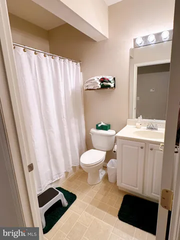 a bathroom with a sink and toilet
