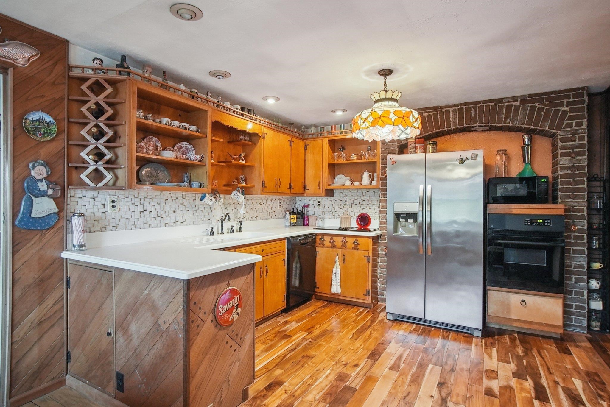 42 Frederick Street Carteret, NJ 07008 - Photo 5 of 15 a kitchen with granite countertop a sink stove and refrigerator
