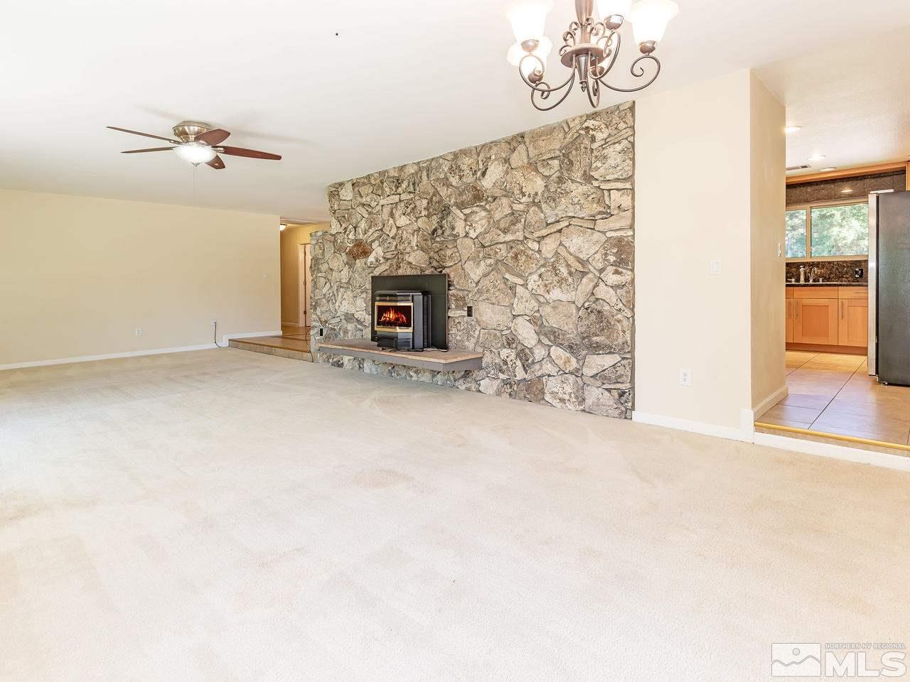 22870 Carriage Drive Reno, NV 89521 - Photo 7 of 16 en empty room with windows