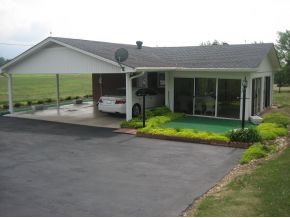 Carport and enclosed sunroom