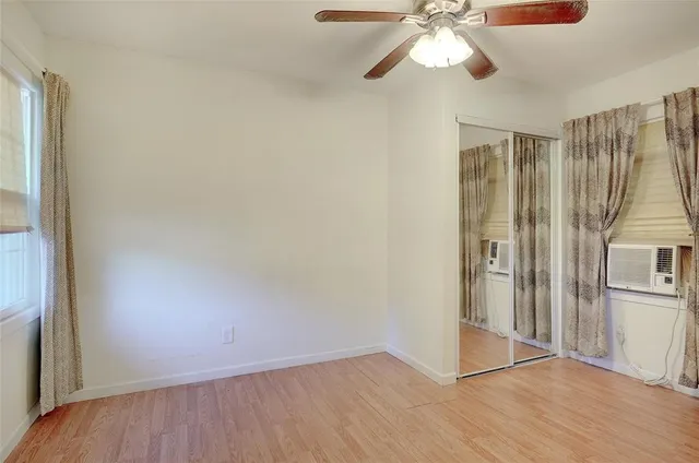 a view of a kitchen from the hallway