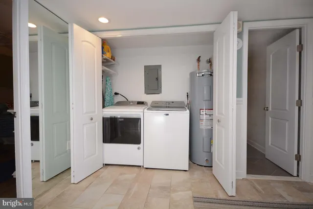 a utility room with cabinets