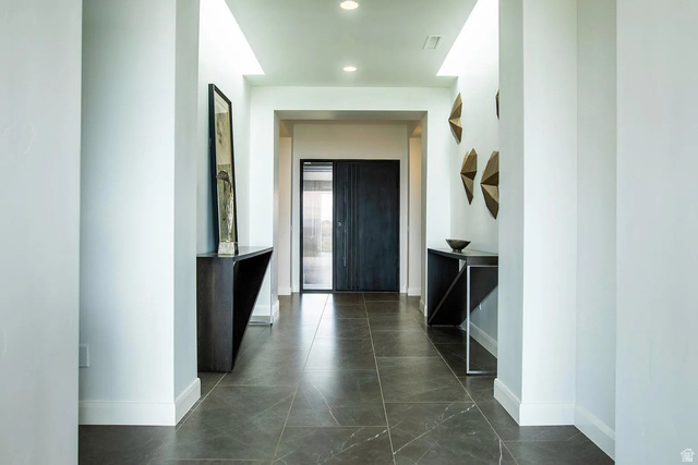 1500 Split Rock, Unit 150 Ivins, UT 84738 - Photo 7 of 14 Entryway featuring large format tile flooring, recessed lighting, and a double-door entry