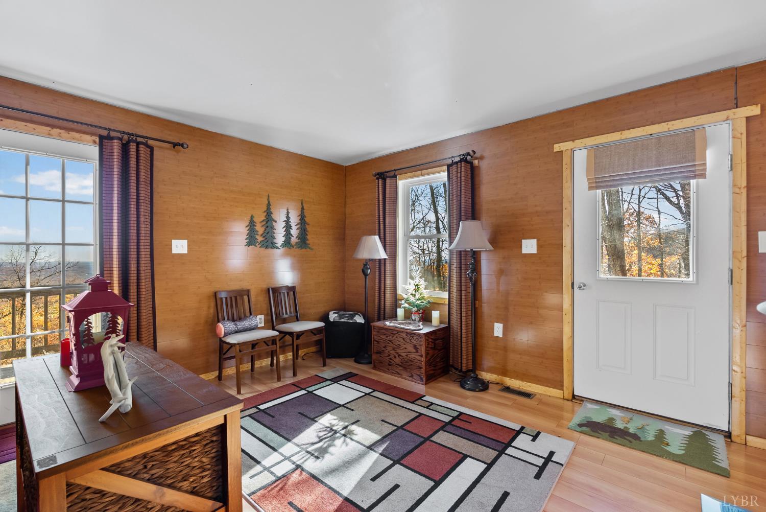 371 Hawks Nest Road Monroe, VA 24574 - Photo 12 of 51 a living room with furniture and a window