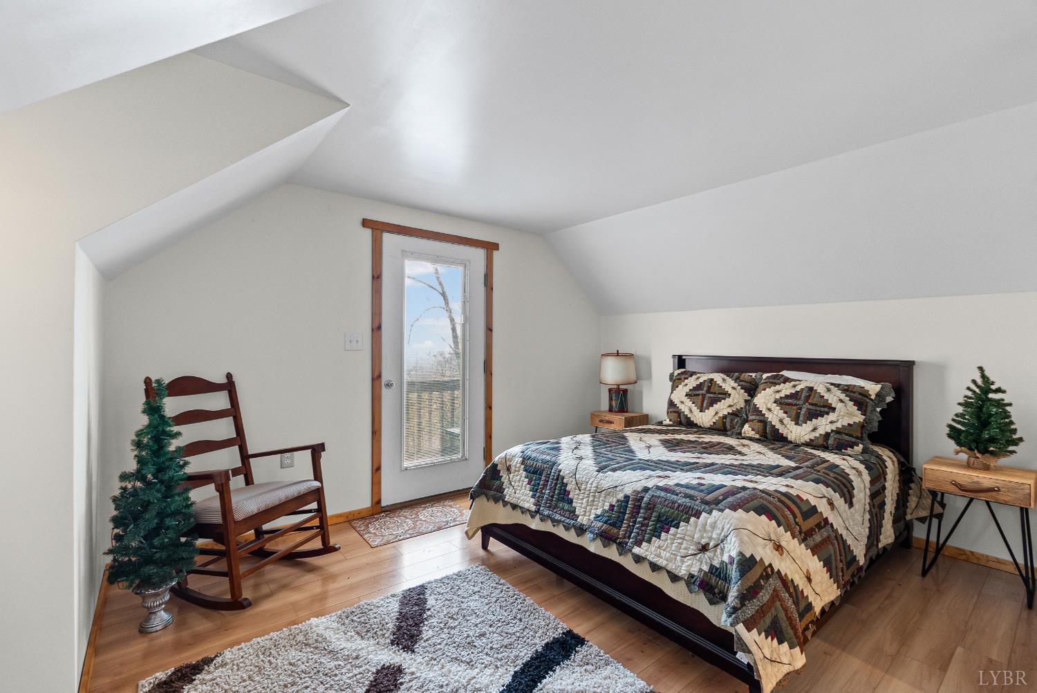 371 Hawks Nest Road Monroe, VA 24574 - Photo 23 of 51 a bedroom with a bed a couch and dresser