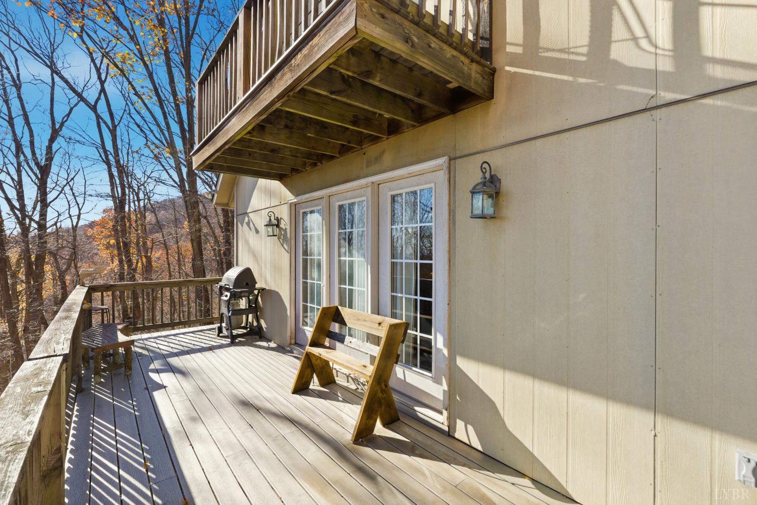 371 Hawks Nest Road Monroe, VA 24574 - Photo 31 of 51 a view of a couches on the deck