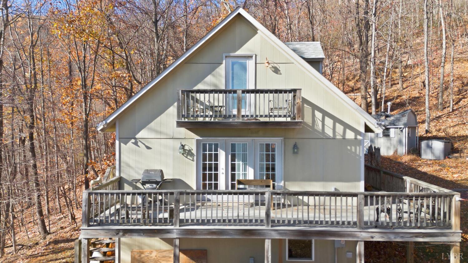 371 Hawks Nest Road Monroe, VA 24574 - Photo 32 of 51 a view of house with a roof deck