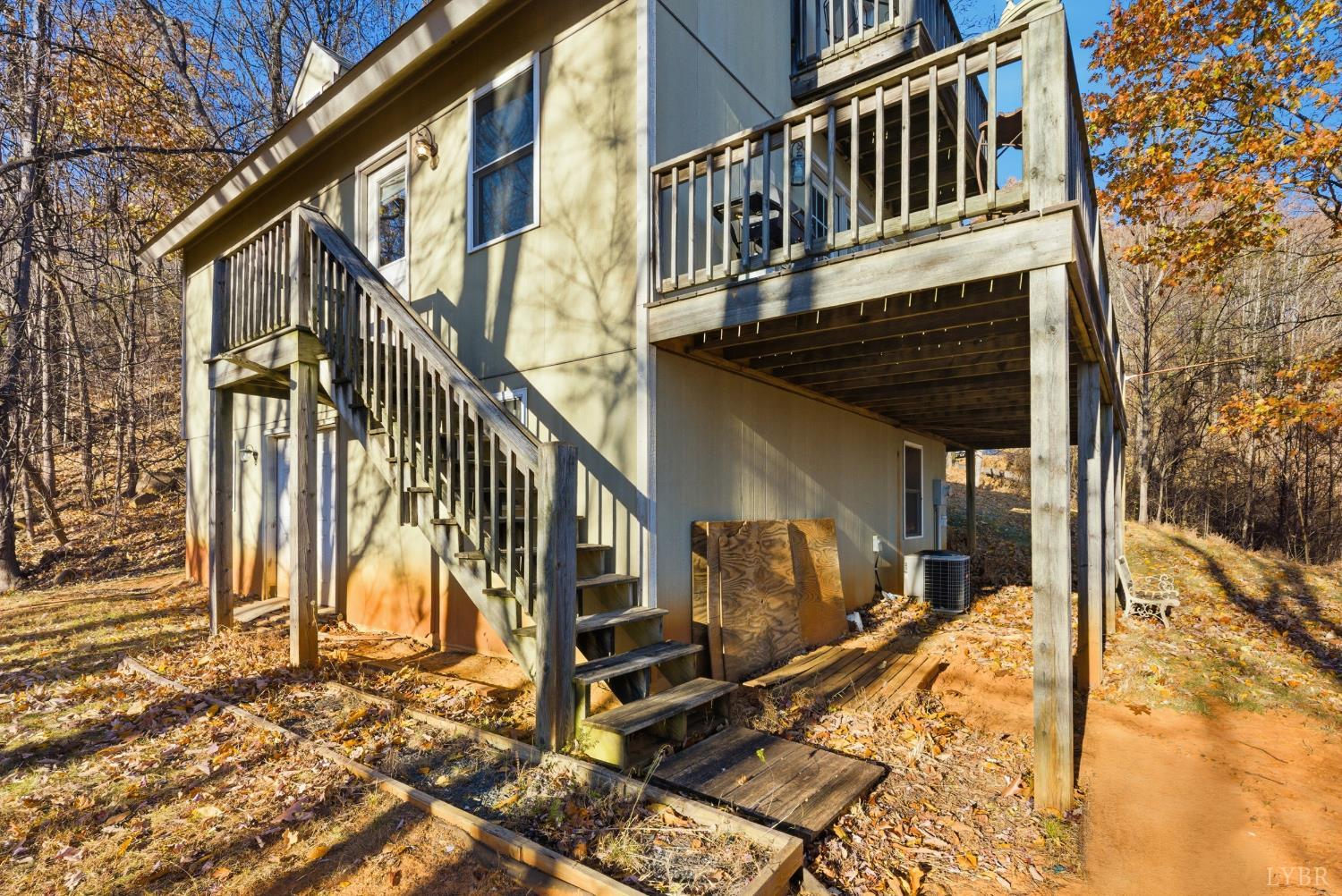 371 Hawks Nest Road Monroe, VA 24574 - Photo 34 of 51 a view of a house with a patio
