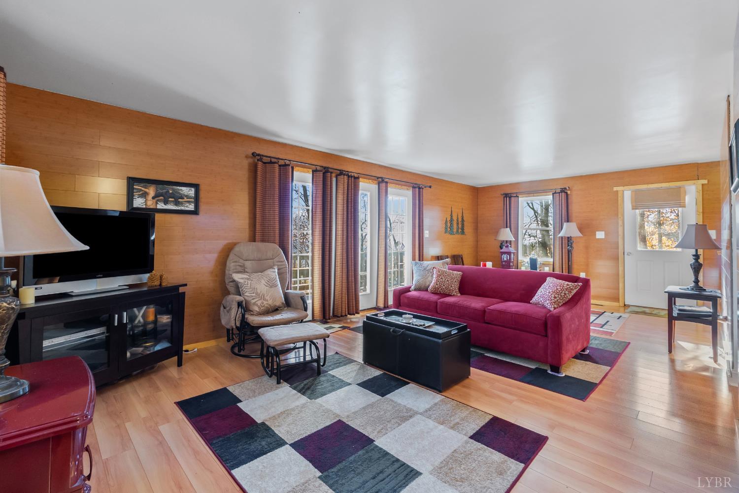 371 Hawks Nest Road Monroe, VA 24574 - Photo 10 of 51 a living room with furniture rug and window